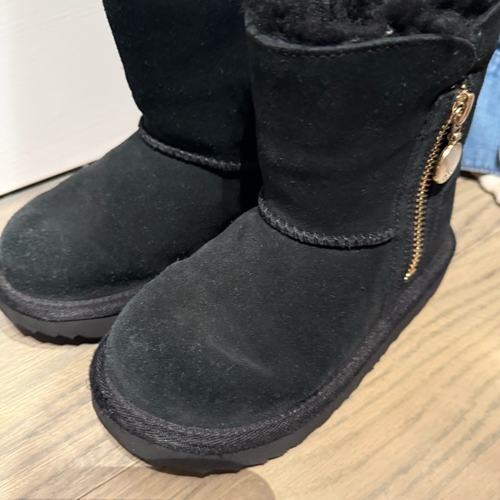 UGG Black Boots with Gold Accent